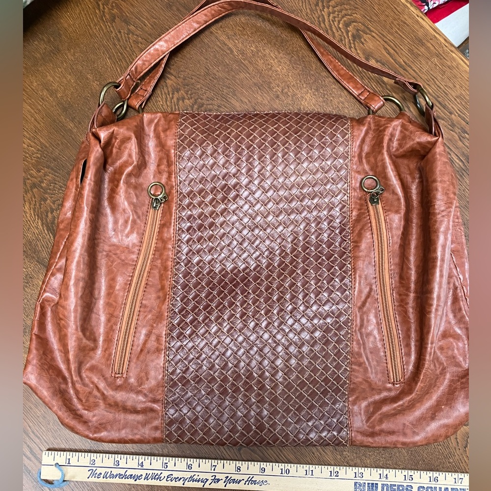 Lg Soft 2handle tooled leather-look rust shoulder bag, decorative zippers front.